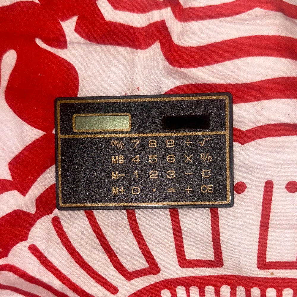 Vintage 89s solar calculator credit card size wallet pocket size wallet pocket